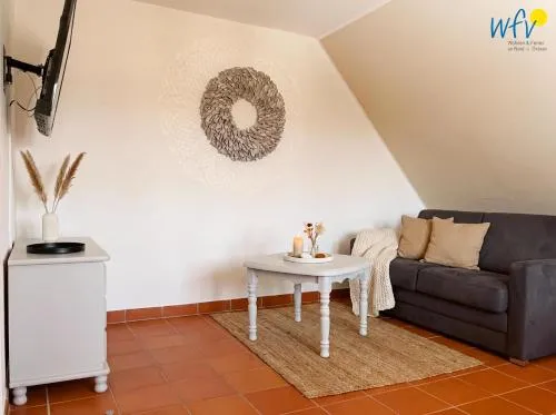 Ferienhaus am Gutspark Drankse Ferienwohnung Sonnenrose in Dranske, Deutschland
