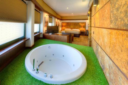 Pezsgőfürdő, 25 négyzetméteres, 1 hálószobás Apartman 1 fürdőszobával Fuente del Gallo Beach területén (Apartamentos El Roqueo) in Fuente del Gallo Beach