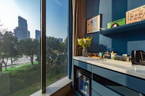 Atour Hotel Ningbo Sanjiangkou Bund Bookstore in Jiangdong District