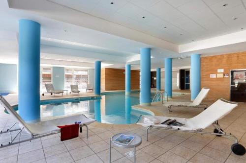 Pied des pistes, appartement ski aux pieds, accès piscine et hammam