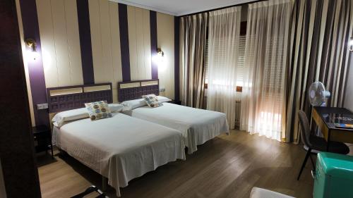 Chambre triple, balcon, 3 lits