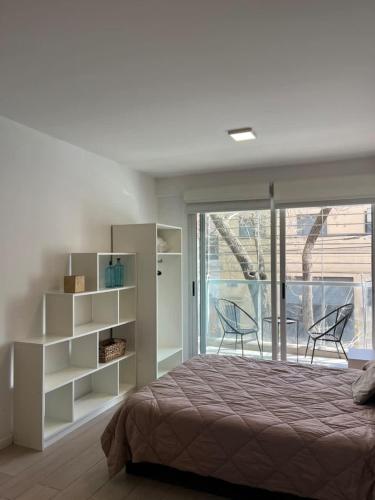 Studio con amenities zona Hospital Italiamo 16