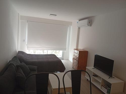 Studio con amenities zona Hospital Italiamo 42