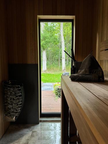 Mežsarga namiņš (Mezsarga namins) in Grozas