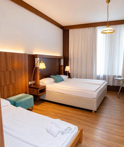 Dreibettzimmer