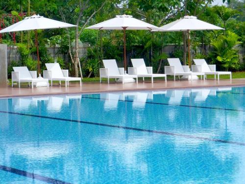 Swimming pool, Nunia Inn Bandara Jakarta near Bungaaaaa