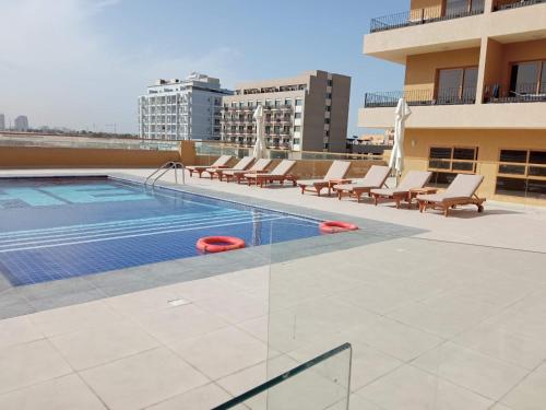Swimming pool, Peaceful Apartments in Dubai International City