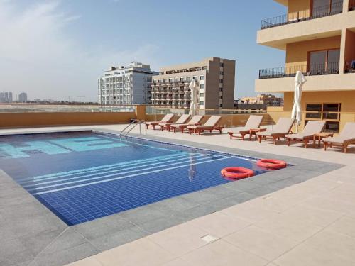 Swimming pool, Peaceful Apartments in Dubai International City