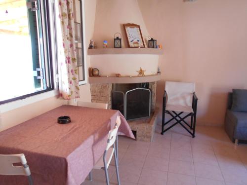 Kitchen, Zephyros Rooms And Apartments in Drymon