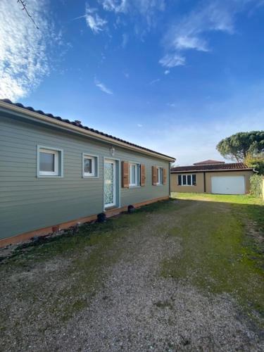 Indgang, La Maison en Bois in Tournefeuille