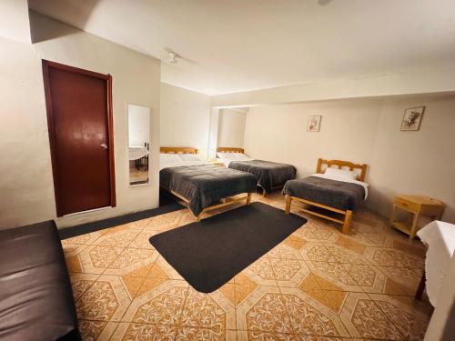 2 double beds, 1 twin bed