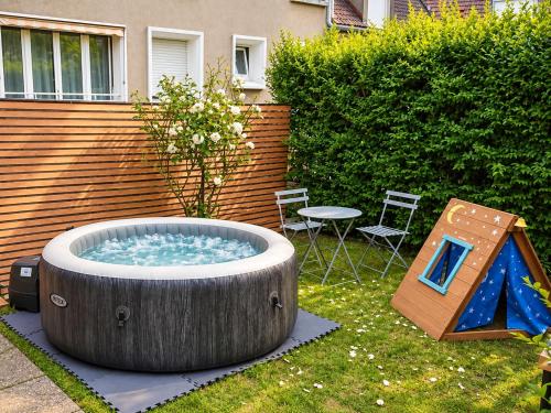 Spa , jardin 250m2 et appartement cosy de 60 m2 au centre