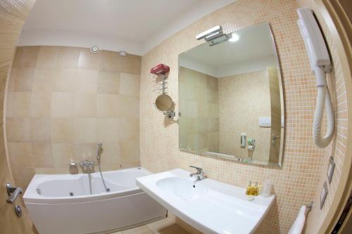 Centrum Palace Hotel & Resorts - 화장실