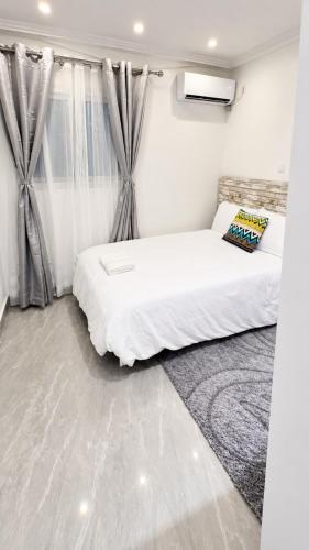 ELYSIUM PROPERTIES Apartamento moderno de 1 dormitorio en el centro de la ciudad de Bata in Bata