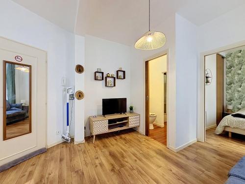 Shared lounge/TV area, Le Petit Moulin in Montbeliard