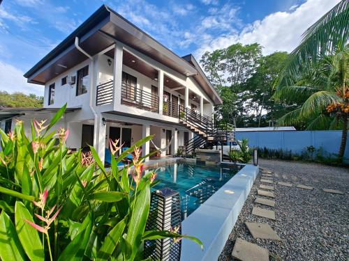 . AJ Suites - Modern Beach Apartments with Pool and Full Kitchen