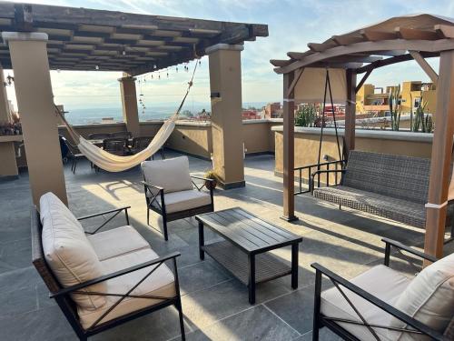 Luxury Rooftop Residence with Pool, Gym and Green Spaces