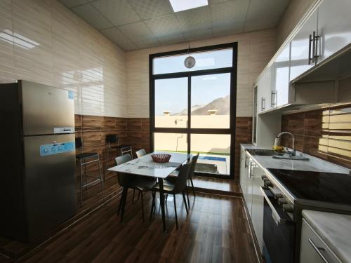 Masfout Escapes Private Mountain Villas in Sinadil