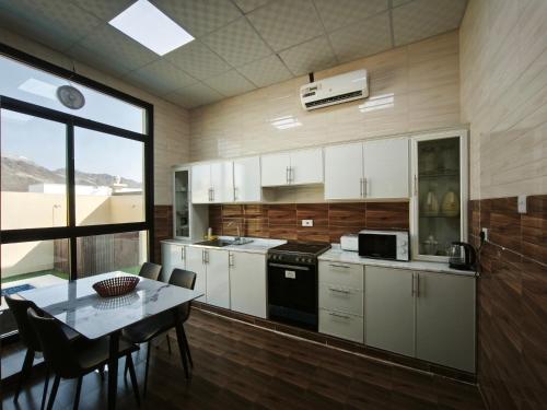 Masfout Escapes Private Mountain Villas in Sinadil