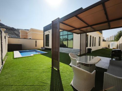 Masfout Escapes Private Mountain Villas in Sinadil