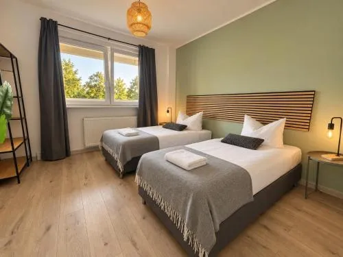 Havn Apartments - 5 Einzelbetten Boxspring, Küche, WIFI, Smart TV, Balkon, 24h Check-In in Halle an der Saale, Deutschland