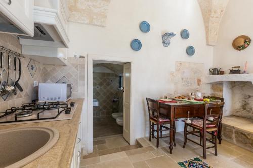 Kitchen, Casale Cappuccio Apartments in Zona Sisri