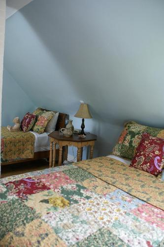 Room with Queen Bed and Double Bed