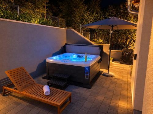 Ady Wellness Apartmanház - Privát jacuzzi & infraszauna