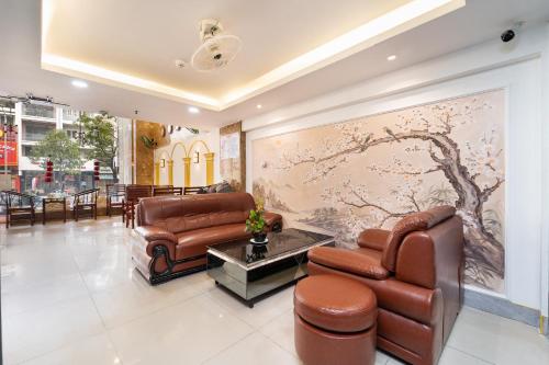 Shared lounge/TV area, LUXURY HOTEL HAU GIANG in District 6