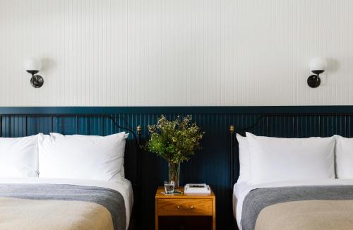 Superior Room with Two Queen Beds and Air Conditioning