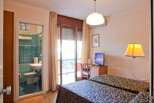 Triple Room with Balcony (2 Adults + 1 Child)