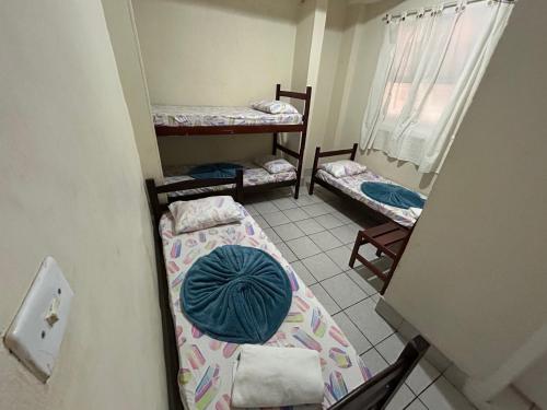 2 twin beds, 1 bunk bed