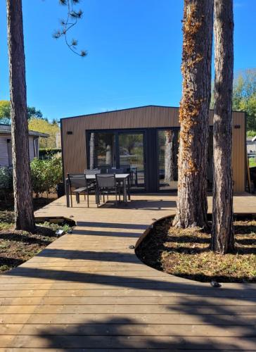 Moderne vakantiewoning Carpa voor 2 personen aan het water gîte à louer Den Veind