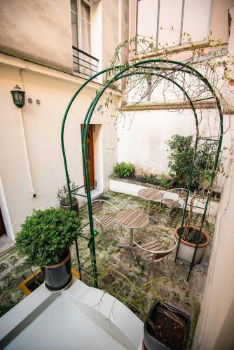 Paris-Oasis Montmartre, París (foto 7)
