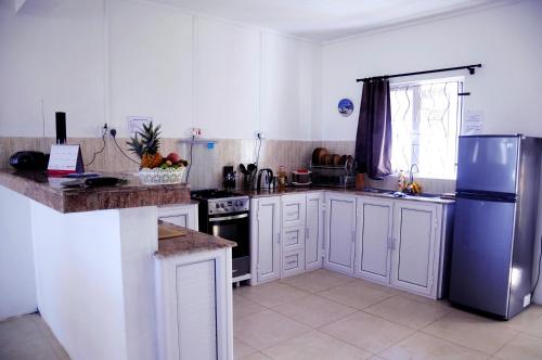 مطبخ, Le Paradisier Guest House in Quatre Vents