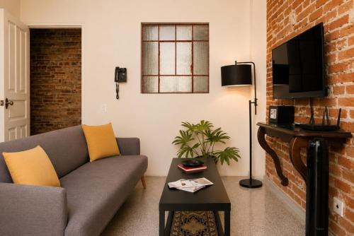 Loft #101 en centro histórico con balcones y terraza común