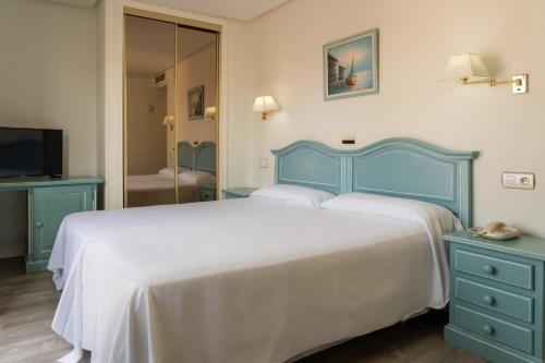 Dvoulůžko nebo dvoulůžkový pokoj s oddělenými lůžky, balkon