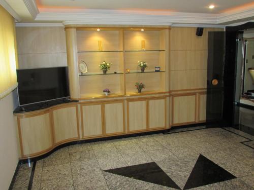 ห้องส่วนกลางสำหรับนั่งเล่น/ดูทีวี, Pleasant Place Hotel in วิลามาเรีย