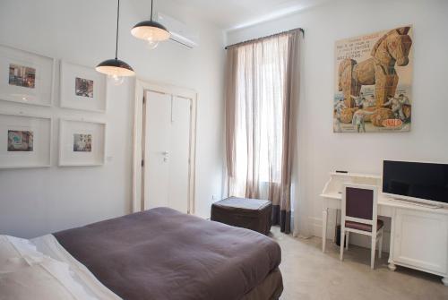 Belledonne Suite & Gallery Belledonne Suite & Gallery is perfectly located for both business and leisure guests in Naples. The property has everything you need for a comfortable stay. Service-minded staff will welcome and guide