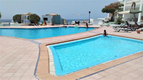 Apartamento Renovado,vistas piscina, aire acondicionado,wifi 2