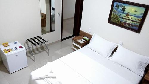 Pousada Real Pousada Real is conveniently located in the popular Sinop area. Featuring a satisfying list of amenities, guests will find their stay at the property a comfortable one. Service-minded staff will welco