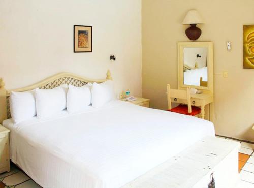 Hotel Belmar Located in Isla Mujeres, Hotel Belmar is a perfect starting point from which to explore Cancun. The property offers a high standard of service and amenities to suit the individual needs of all travele