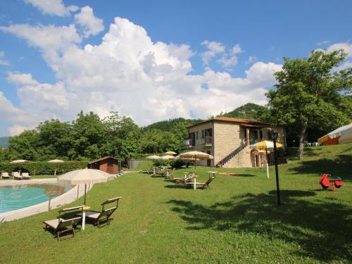 Exterior view, Property with swimming pool spacious garden private terrace and views in Apecchio