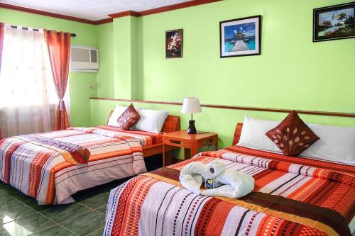Blue Corals Beach Resort Room Type - Deluxe Queen Suite