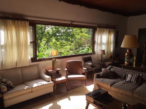Koplietošanas atpūtas telpa ar TV, Pousada Fazenda Pinhalzinho in Ribeirao Claro