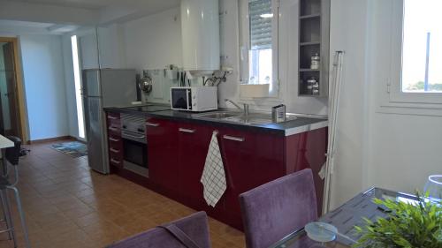 Konyha, loft con terraza y barbacoa in Lumpiaque