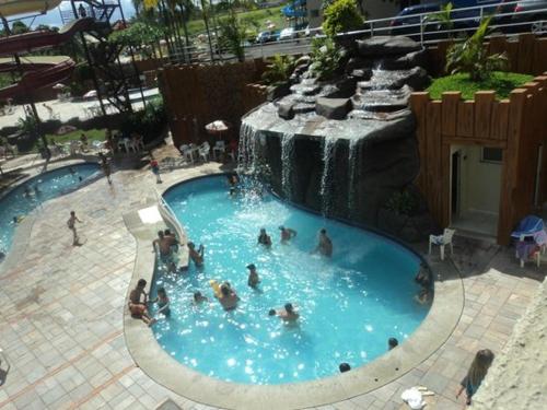 Swimming pool, Apartamento Golden Dolphin express in Caldas Novas