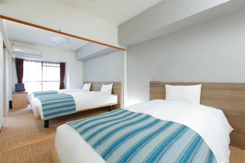 Standard Triple Room - Non-Smoking - House Keeping is Optional with Additional Cost image 4