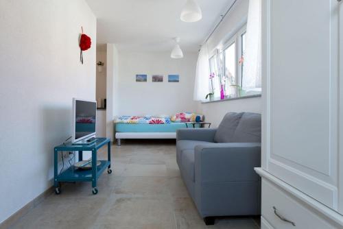 Ferienwohnungen Herzle in บาด โครซิงเงน