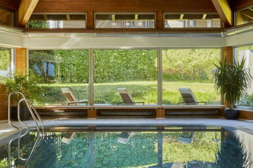 Úszómedence, H+ Hotel Alpina Garmisch-Partenkirchen in Garmisch-Partenkirchen Városközpont